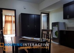 a semi furnished 1-bedroom unit in the san lorenzo place