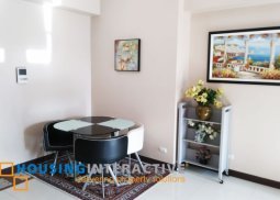semi-furnished 1-bedroom unit in 8 forbestown road bgc