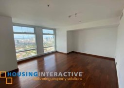 semi furnished 3 br unit for rent at two roxas triangle makati (long-term lease only)