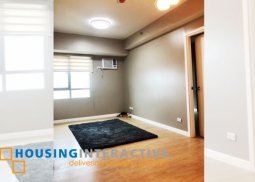 modern spacious semi-furnished 2-bedroom unit for sale in the grove