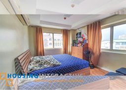 luxurious fully furnished 3-bedroom bi-level penthouse with balcony for sale in mckinley hill garden villas