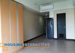 semi furnished studio type unit in paseo heights