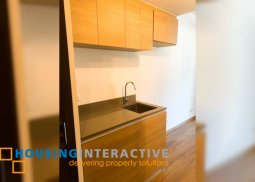 semi furnished 1br unit for sale in the rise makati