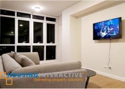 fully furnished 2-bedroom unit for rent in two serendra