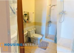semi furnished 1-bedroom unit for sale in trion towers
