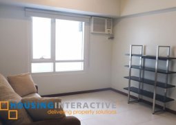 semi-furnished 2-bedroom unit for rent in the columns legazpi