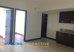 semi-furnished 2-bedroom unit for sale in san lorenzo place