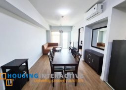 fully furnished 1-bedroom unit with balcony for rent in two serendra