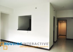 semi-furnished 2-bedroom unit with balcony for rent in two serendra