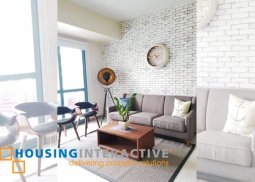 modern 2-bedroom unit with balcony for lease in one uptown residences bgc