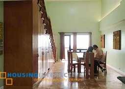 semi-furnished 1-bedroom loft unit with balcony for sale in bsa tower