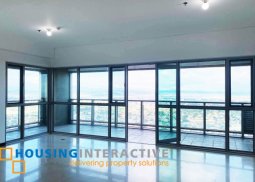 bare 3-bedroom unit with balcony for sale in one serendra