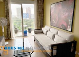 fully furnished 2-bedroom unit with balcony for rent in two serendra