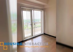 semi-furnished 1-bedroom unit with balcony for sale/rent in fairway terraces