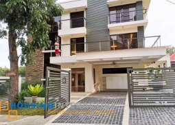 semi-furnished 3-storey, 5-bedroom house with balcony for sale in manila southwoods