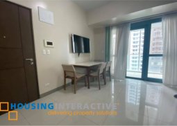 fully furnished 2-bedroom unit with balcony for sale in one uptown residences