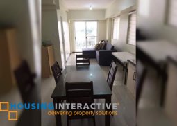 fully furnished 2-bedroom unit with balcony for sale in viera residences