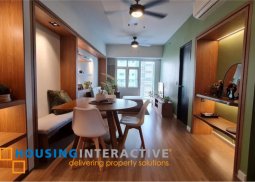 fully furnished 1-bedroom unit with balcony for rent in two serendra