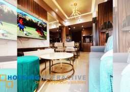 fully furnished 2-bedroom unit with balcony for sale in the radiance
