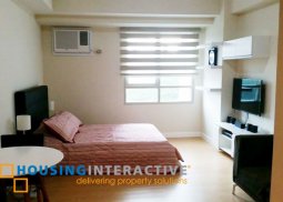 fully furnished studio unit with parking for sale in the grove