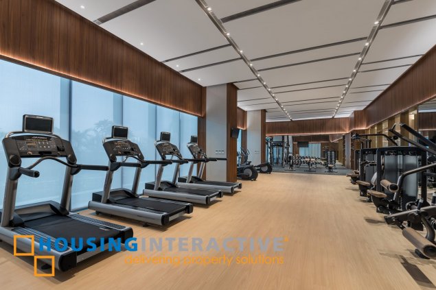 furnished one-bedroom unit with parking in shang salcedo for rent