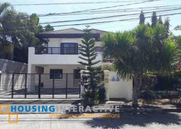 grand 2-storey, 4-bedroom house with pool for sale