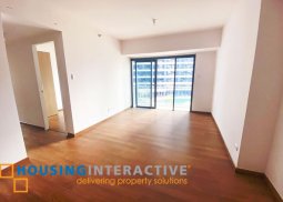 bare 2-bedroom unit with balcony for rent in the rise