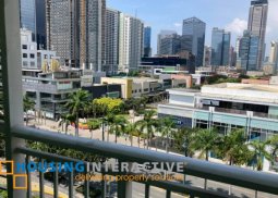 fully furnished 2-bedroom unit with balcony for rent in one serendra