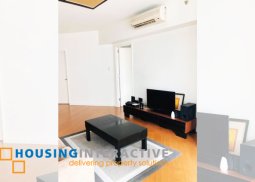 fully furnished 1-bedroom unit with balcony for rent in one rockwell