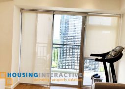 fully furnished 2-bedroom unit with balcony for sale in verve residences