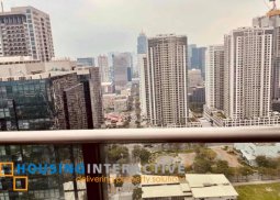 fully furnished 2-bedroom unit with balcony for sale in arya residences