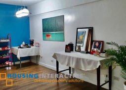 fully furnished 2-bedroom unit with balcony for sale in royal palm residences