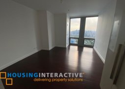 semi-furnished 4-bedroom unit with balcony for rent in the suites