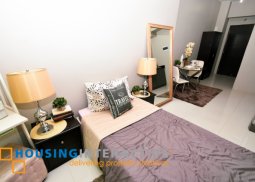 a fully furnished studio unit for sale in the symphony towers