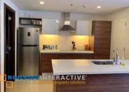 fully furnished 2-bedroom unit with balcony for sale in garden towers
