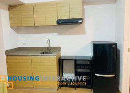 a fully furnished 1 br w/ balcony unit for lease in the rise makati