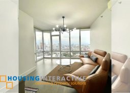 fully furnished 2-bedroom unit with balcony for sale in proscenium at rockwell