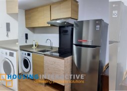 fully furnished 1br with balcony in northwing the rise makati city