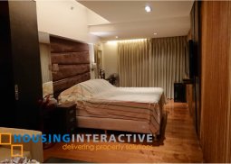 a fully furnished 2-bedroom bi-level unit with balcony for sale in eton residences