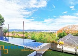 luxurious 4-bedroom house with pool for sale in loyola grand villas