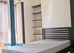 a semi-furnished studio bedroom unit for lease in paseo parkview suites