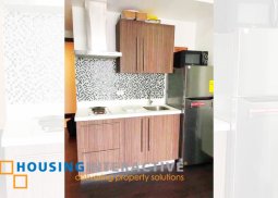 fully furnished 1-bedroom unit with balcony for rent in acqua private residences