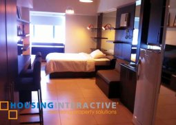 a fully furnished studio unit for sale in the columns legazpi