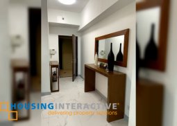 a fully furnished 2 bedroom unit for lease in malayan plaza pasig
