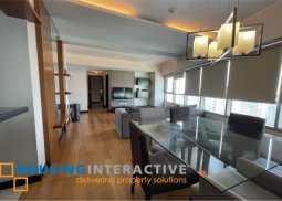 a 2 bedroom w/ balcony at the residences at greenbelt
