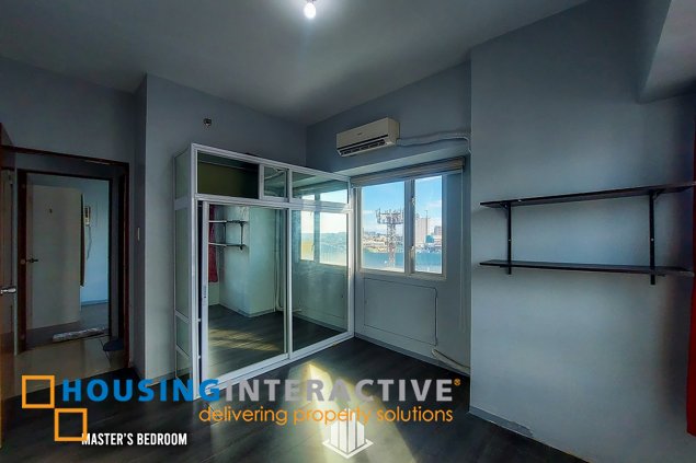 a semi-furnished 2 bedroom unit for sale in the beacon