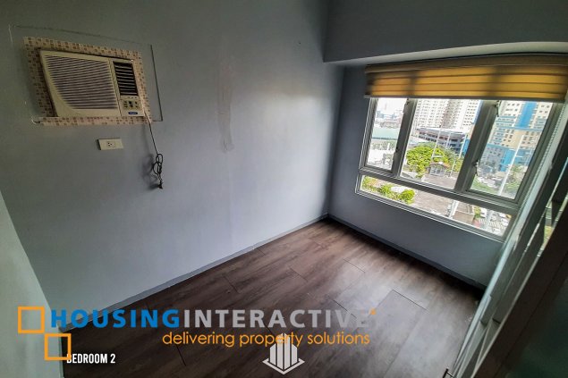 a semi-furnished 2 bedroom unit for sale in the beacon