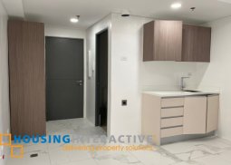 unfurnished studio unit with balcony for lease in dream tower