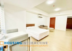 a fully furnished studio unit for sale in two central
