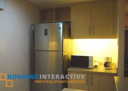 fully furnished 2-bedroom unit with balcony for sale in the manansala